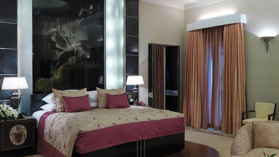 Maharani-Suite-Bedroom, Umaid Bhawan Palace, India, with paintings by Stefana Norblin, photo: kiwicollection